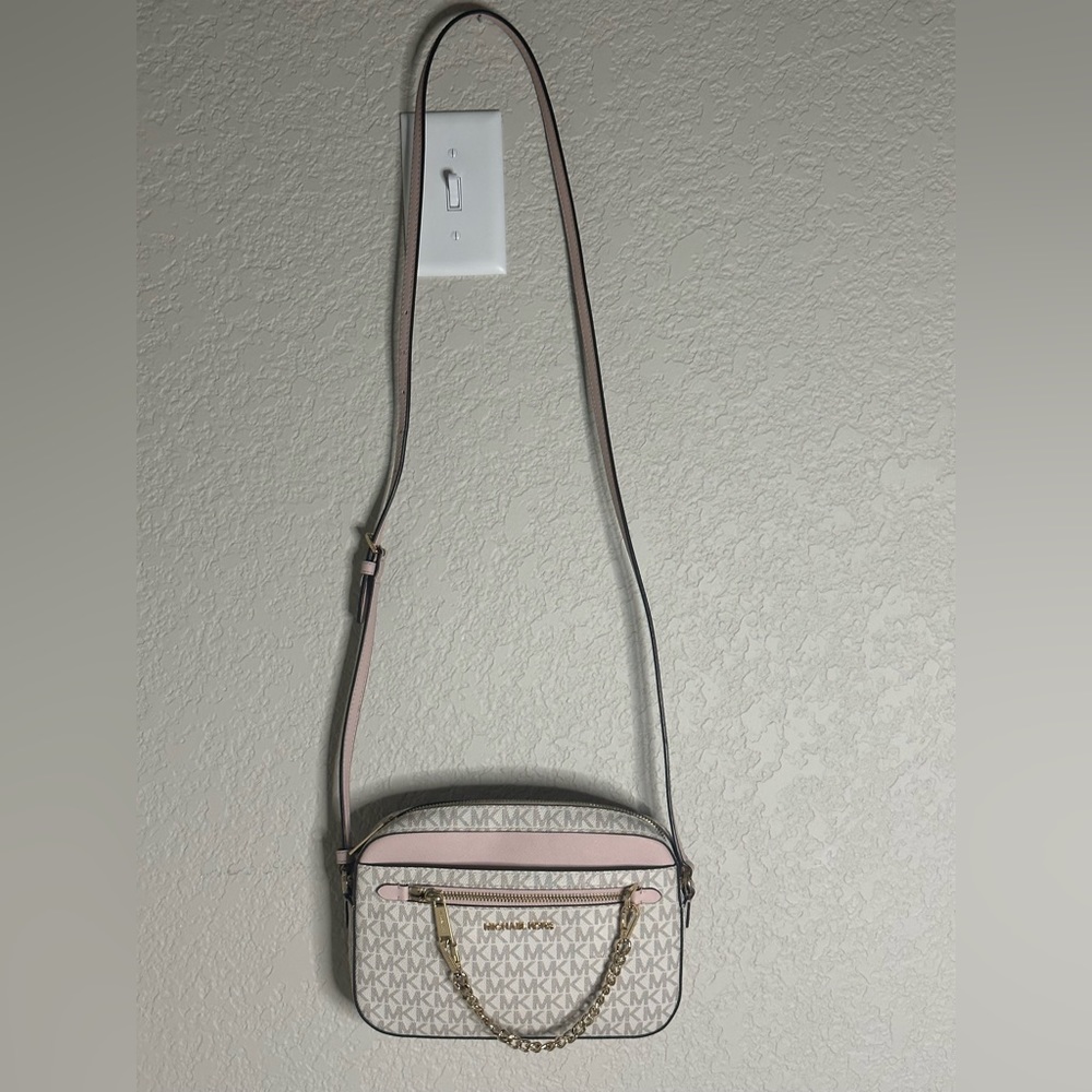 Cute Michael Kors crossbody purse! Pink/White. Authentic. Only used a few times.